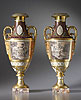 A fine pair of Empire gilt bronze mounted gilt and polychrome painted Paris Porcelain two-handled vases bearing the decorator’s indistinct signature L[?]evalleur